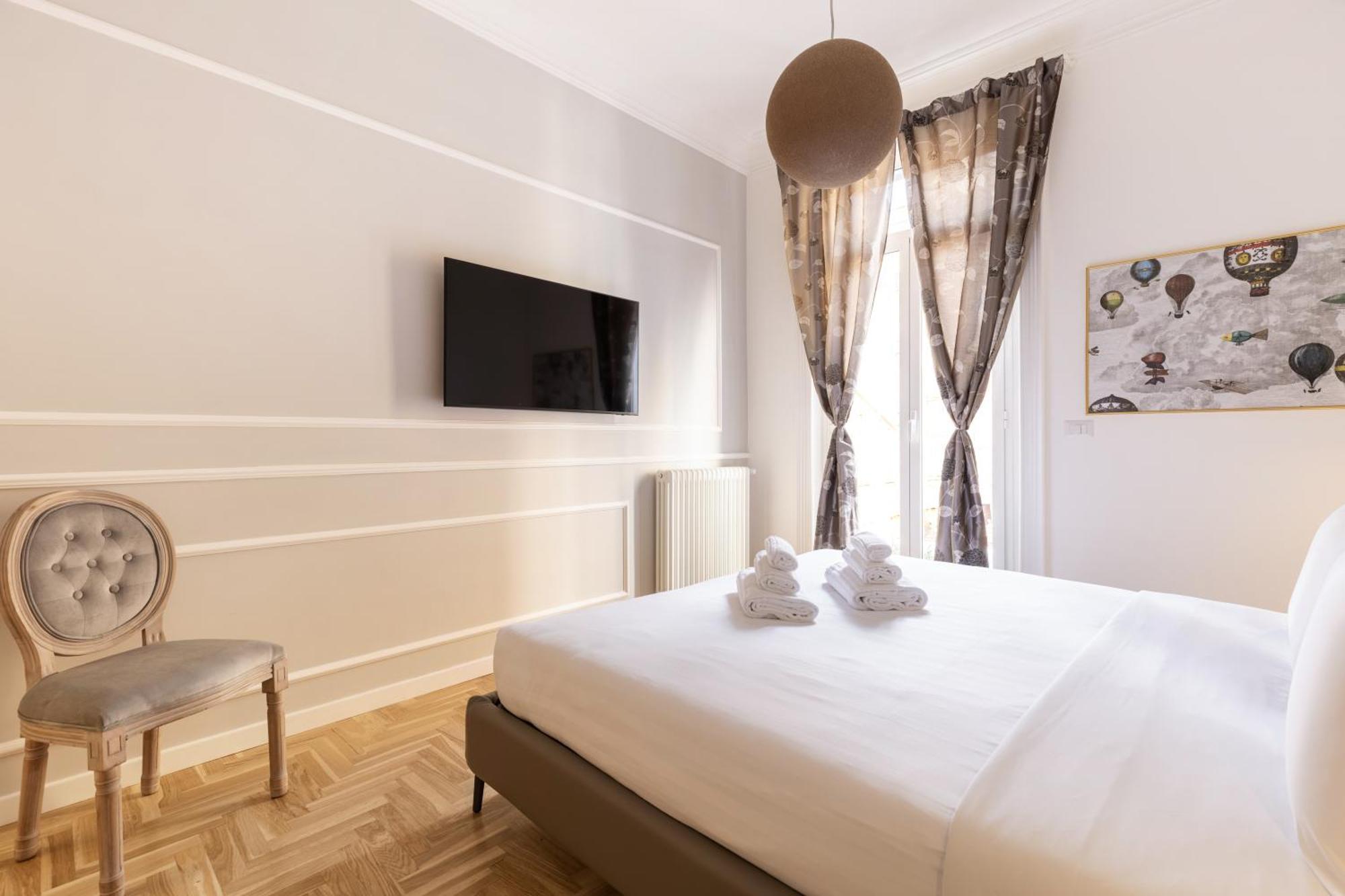 Appartamento Hostly-puccini Luxury Home-near Colosseum & Trevi *